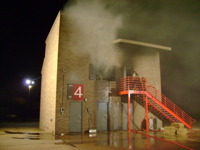 MCFA Live Burn 10/07 - The hose team ventilates the structure